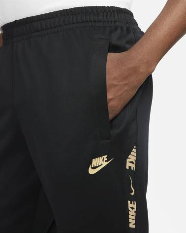 NIKE PANTALONE LOGO RIPETUTO LATERALE ACETATO